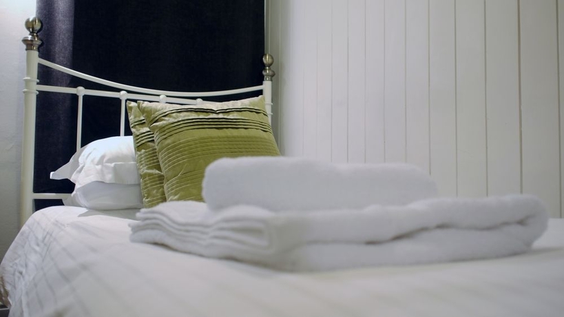 Imagen de la habitación del Hostal Camelot Guest House. Foto 7