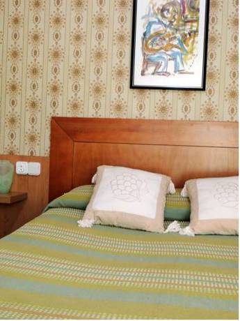 Imagen de la habitación del Hostal Can Massot. Foto 9