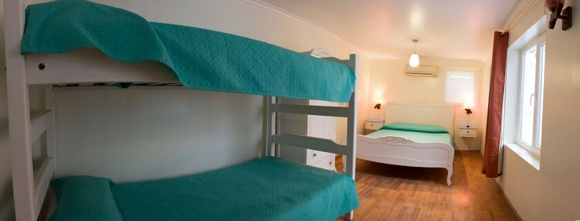 Imagen de la habitación del Hostal Casa Aborigen. Foto 13