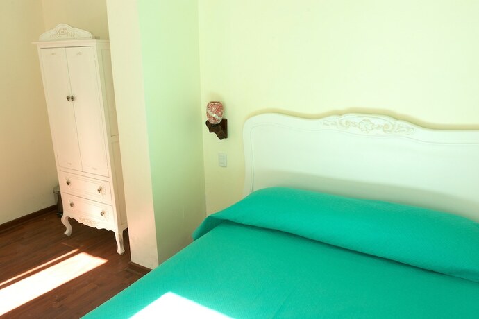 Imagen de la habitación del Hostal Casa Aborigen. Foto 17