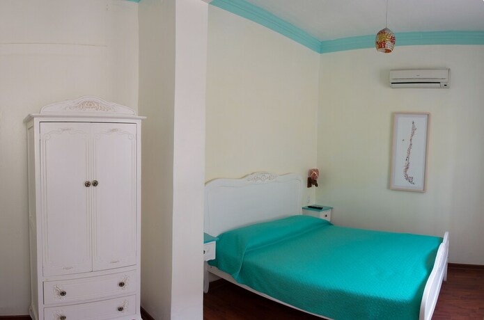 Imagen de la habitación del Hostal Casa Aborigen. Foto 22