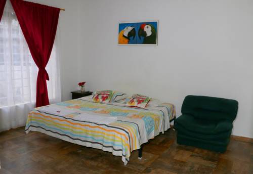 Imagen de la habitación del Hostal Casa Del Gato Cali. Foto 2