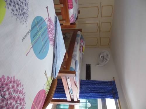 Imagen de la habitación del Hostal Casa Del Gato Cali. Foto 4