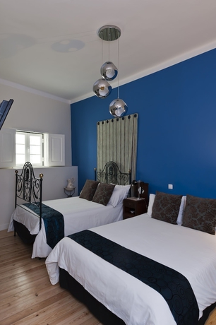 Imagen de la habitación del Hostal Casa Do Bairro By Shiadu. Foto 9