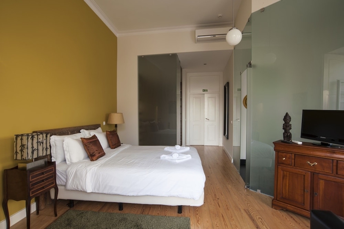 Imagen de la habitación del Hostal Casa Do Bairro By Shiadu. Foto 12