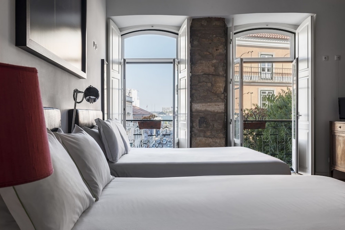 Imagen de la habitación del Hostal Casa Do Bairro By Shiadu. Foto 13