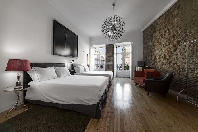 Imagen de la habitación del Hostal Casa Do Bairro By Shiadu. Foto 14