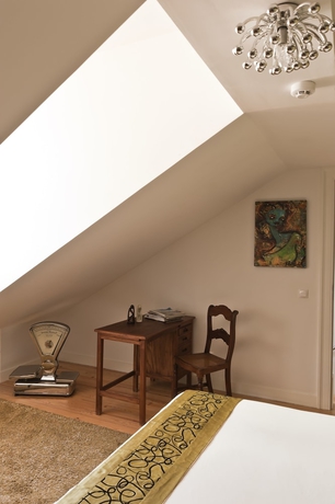 Imagen de la habitación del Hostal Casa Do Bairro By Shiadu. Foto 17