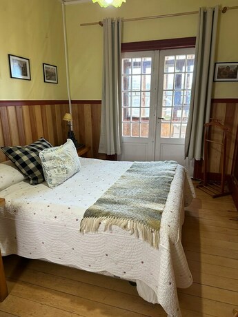 Imagen de la habitación del Hostal Casa Droppelman. Foto 19