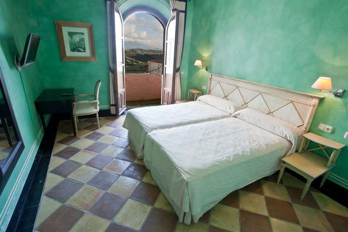 Imagen de la habitación del Hostal Casa Henrietta. Foto 12