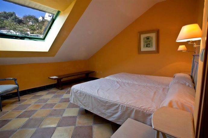 Imagen de la habitación del Hostal Casa Henrietta. Foto 13