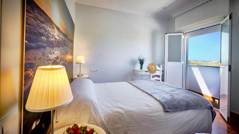Imagen de la habitación del Hostal Casa Reyes El Palmar. Foto 4