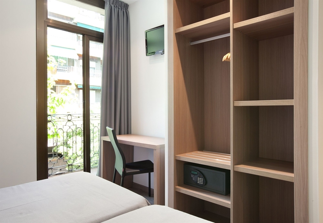 Imagen de la habitación del Hostal Céntric, Eixample. Foto 10