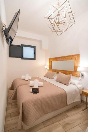 Imagen de la habitación del Hostal Center Suites San Eloy. Foto 6