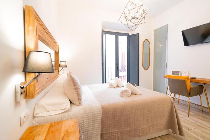 Imagen de la habitación del Hostal Center Suites San Eloy. Foto 13