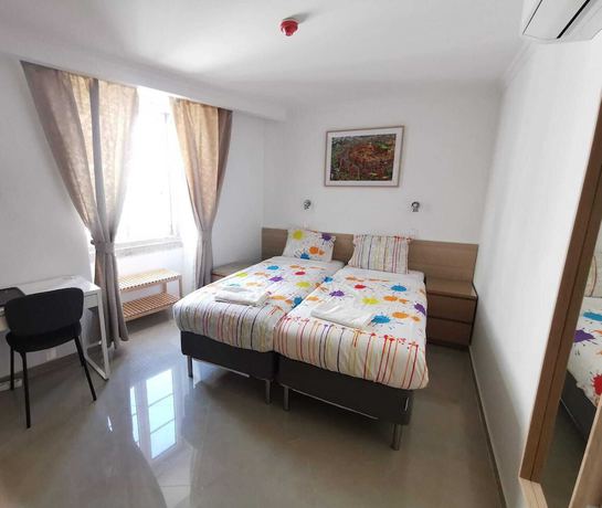Imagen de la habitación del Hostal City INN, Lisboa. Foto 9