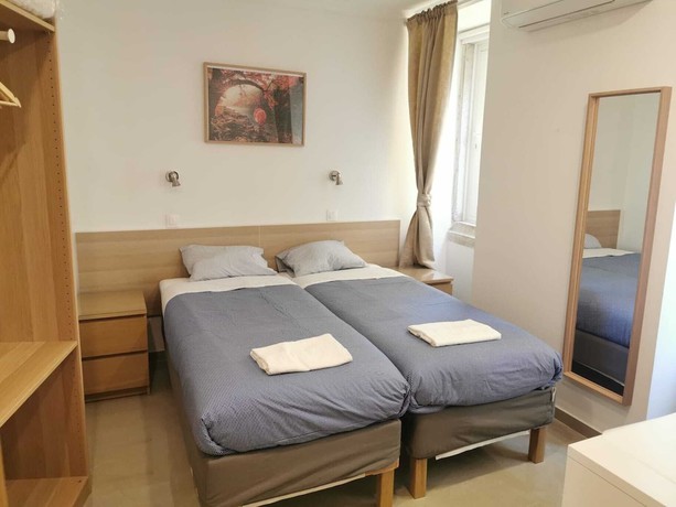Imagen de la habitación del Hostal City INN, Lisboa. Foto 10