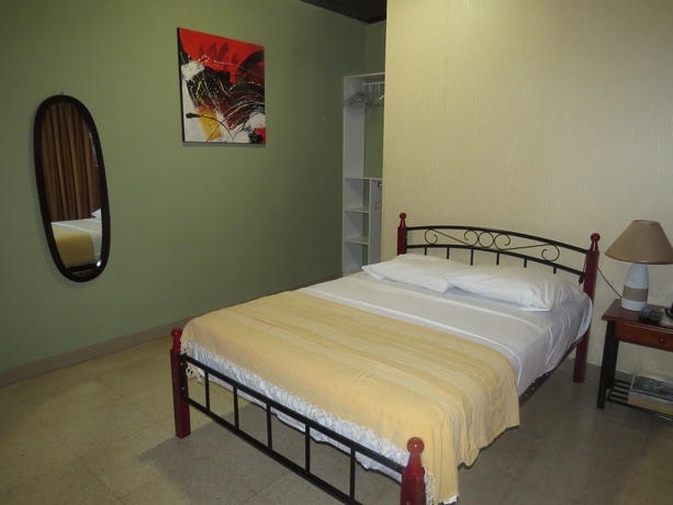 Imagen de la habitación del Hostal Cocos Inn. Foto 6