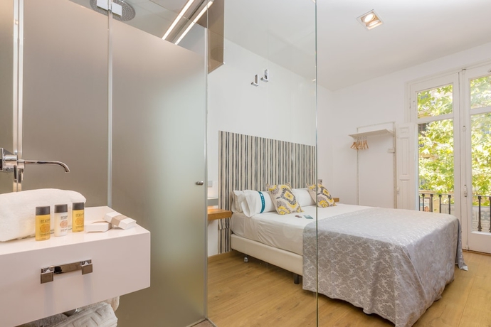 Imagen de la habitación del Hostal Cosmopolitan Boutique Rambla. Foto 2