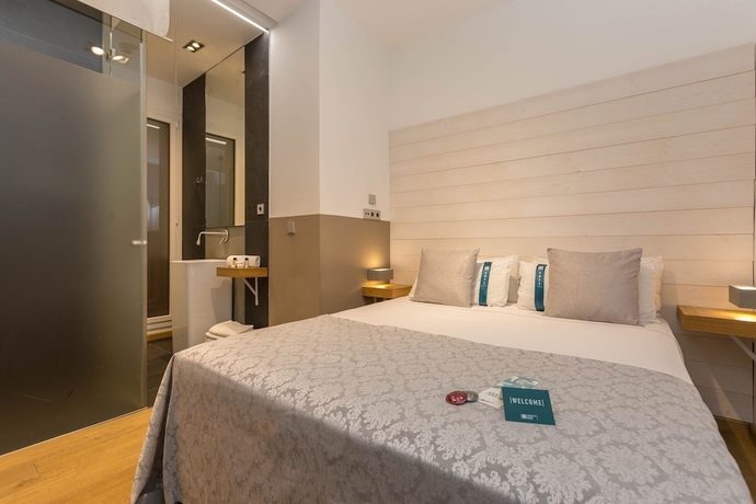 Imagen de la habitación del Hostal Cosmopolitan Boutique Rambla. Foto 5