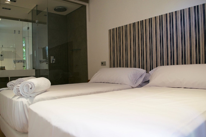 Imagen de la habitación del Hostal Cosmopolitan Boutique Rambla. Foto 11