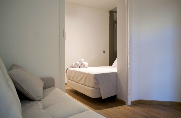 Imagen de la habitación del Hostal Cosmopolitan Boutique Rambla. Foto 13