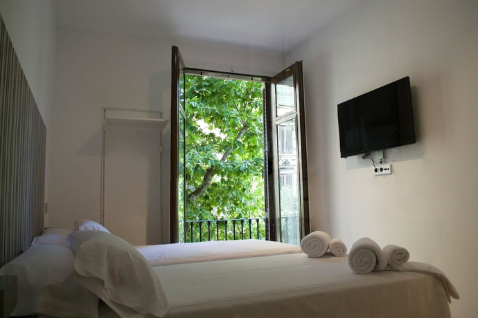 Imagen de la habitación del Hostal Cosmopolitan Boutique Rambla. Foto 14