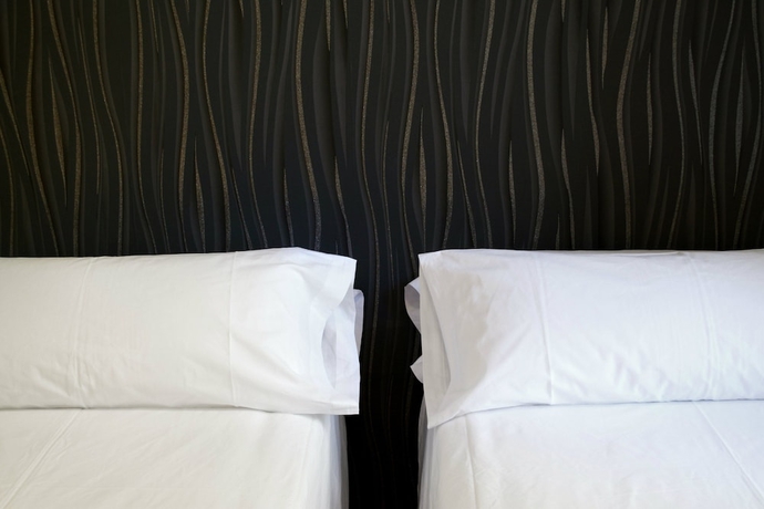 Imagen de la habitación del Hostal Cosmopolitan Boutique Rambla. Foto 15