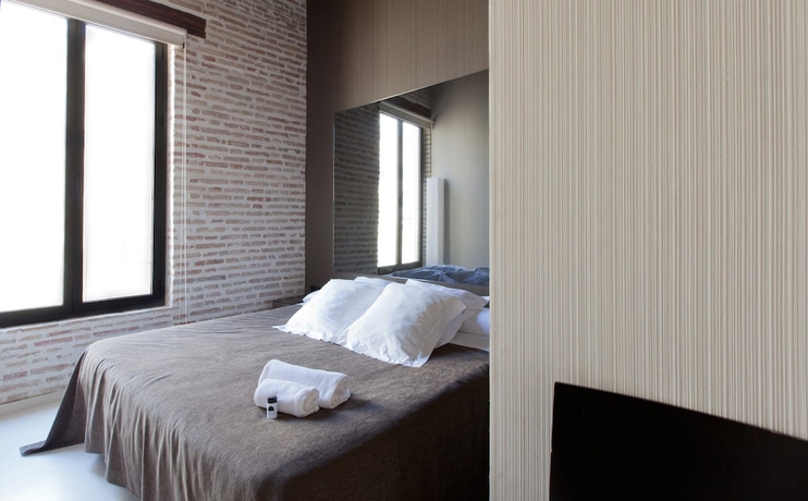 Imagen de la habitación del Hostal Cosy Rooms Embajador. Foto 6