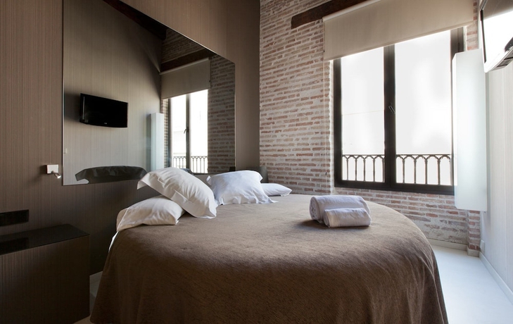 Imagen de la habitación del Hostal Cosy Rooms Embajador. Foto 12