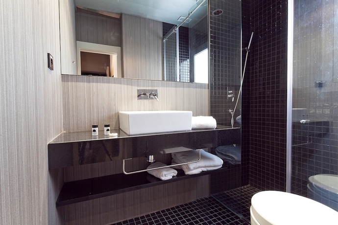 Imagen de la habitación del Hostal Cosy Rooms Embajador. Foto 17