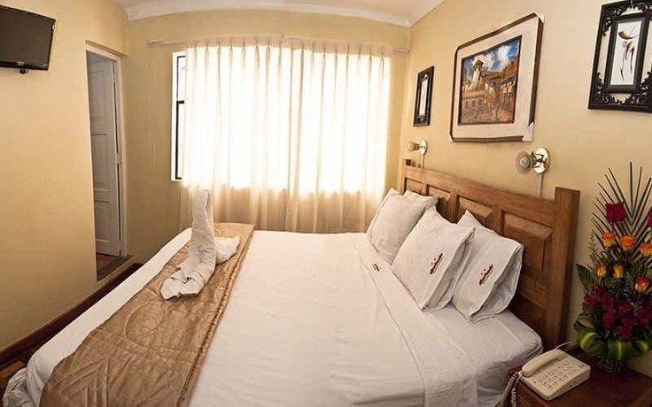 Imagen de la habitación del Hostal Danna Inn. Foto 12