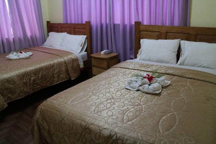 Imagen de la habitación del Hostal Danna Inn. Foto 13
