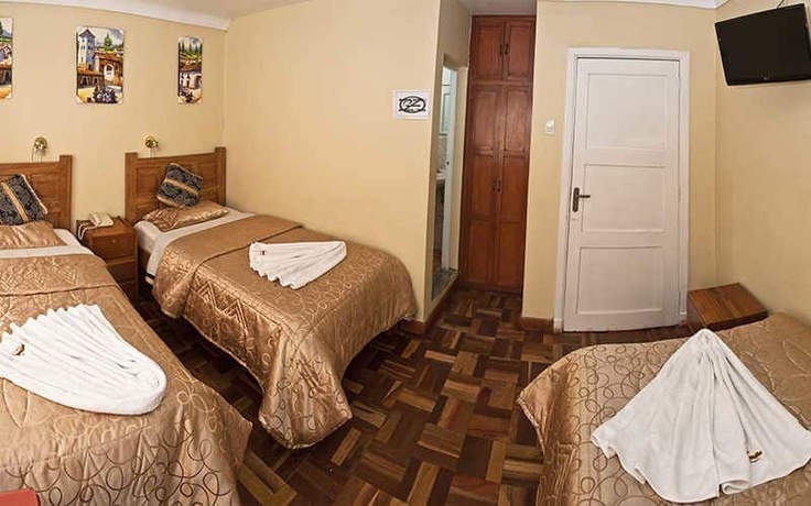 Imagen de la habitación del Hostal Danna Inn. Foto 14