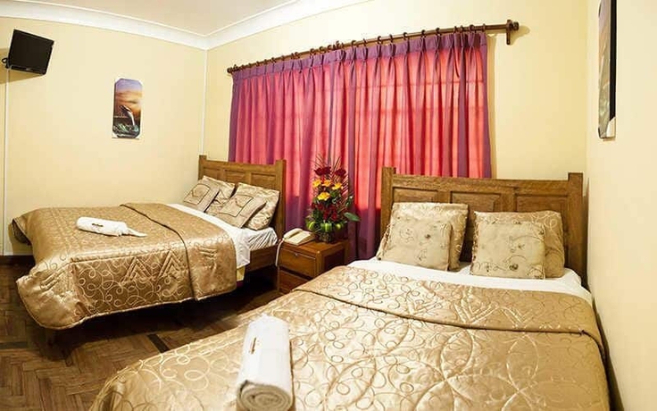 Imagen de la habitación del Hostal Danna Inn. Foto 15