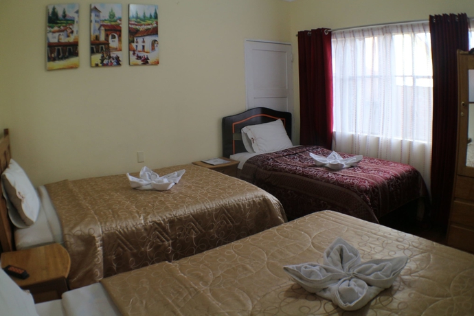 Imagen de la habitación del Hostal Danna Inn. Foto 16