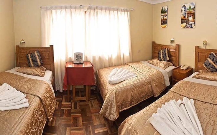 Imagen de la habitación del Hostal Danna Inn. Foto 17
