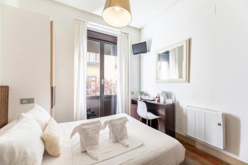 Imagen de la habitación del Hostal Das Barbieri. Foto 16