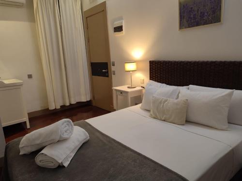 Imagen de la habitación del Hostal Das Barbieri. Foto 19