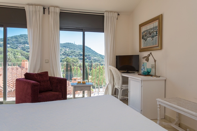 Imagen de la habitación del Hostal De La Plaça. Foto 15