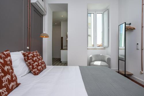 Imagen de la habitación del Hostal Dona Simone Boutique Suites and Studios - by @ rita's place. Foto 20