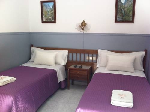 Imagen de la habitación del Hostal Dulcinea, Barrio de las Letras. Foto 8