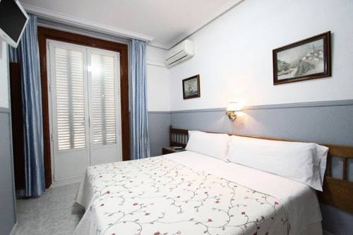 Imagen de la habitación del Hostal Dulcinea, Barrio de las Letras. Foto 12