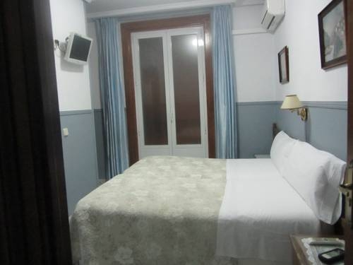 Imagen de la habitación del Hostal Dulcinea, Madrid. Foto 7