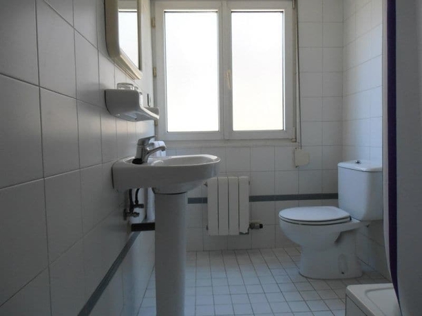 Imagen de la habitación del Hostal Ec Leon. Foto 2