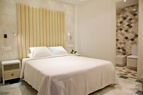 Imagen de la habitación del Hostal El Alojado de Velarde. Foto 9