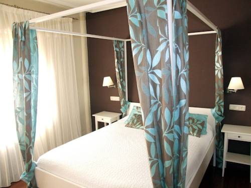 Imagen de la habitación del Hostal El Botero, Monreal del Campo. Foto 9