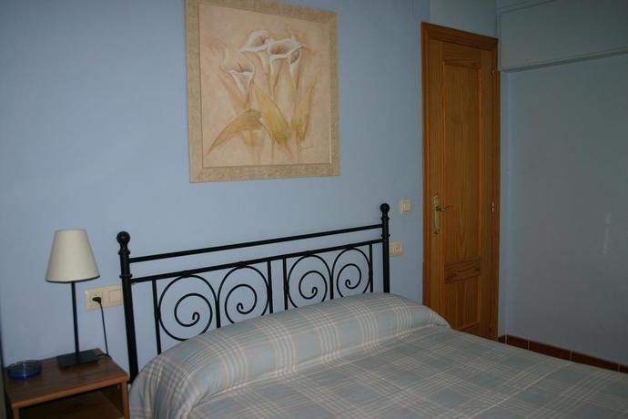 Imagen de la habitación del Hostal El Castillo, Arenas de San Pedro. Foto 6