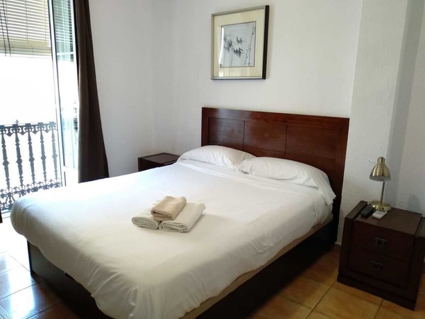 Imagen de la habitación del Hostal El Cid, Valencia. Foto 16