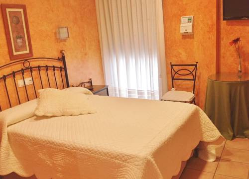 Imagen de la habitación del Hostal El Lechuguero. Foto 9